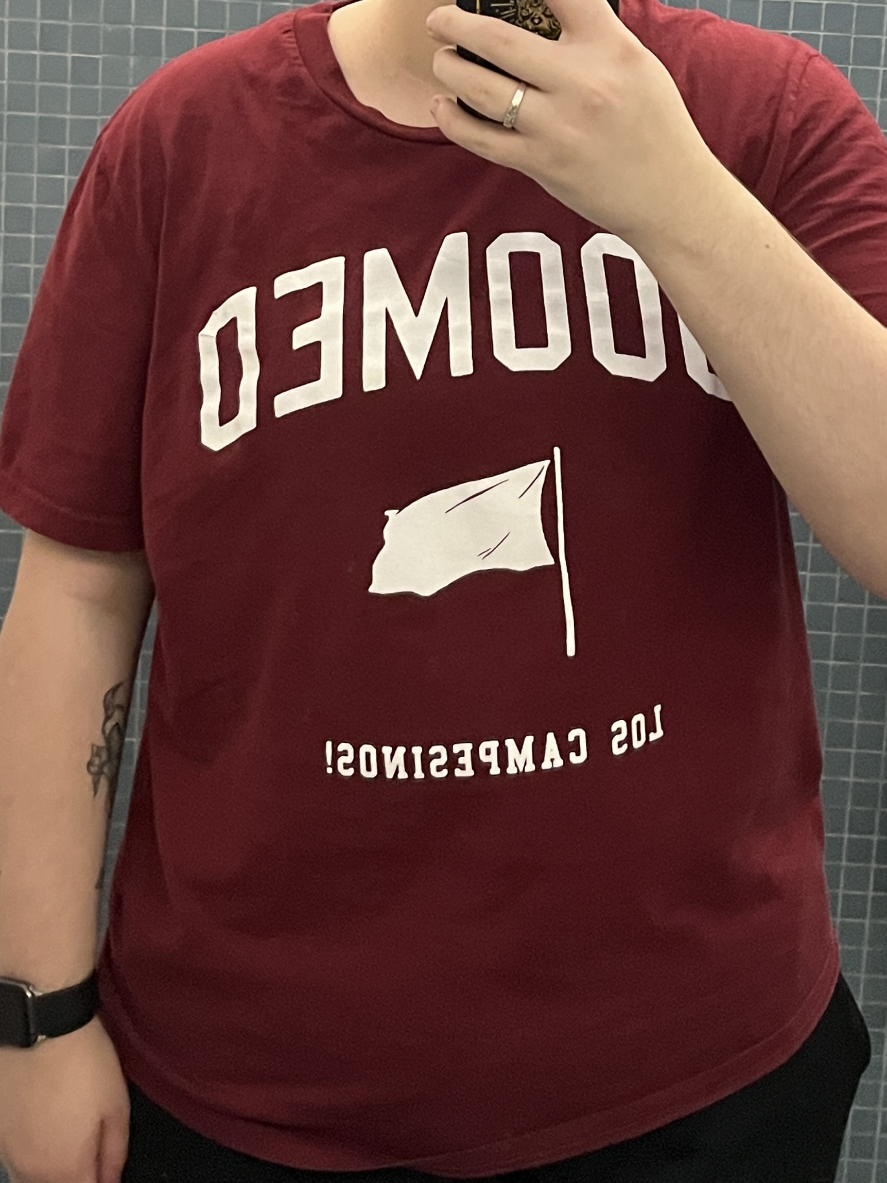 Trans man wearing a red shirt